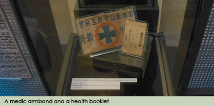 A medic armband and a health booklet